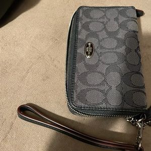 Coach black monogrammed wristlet